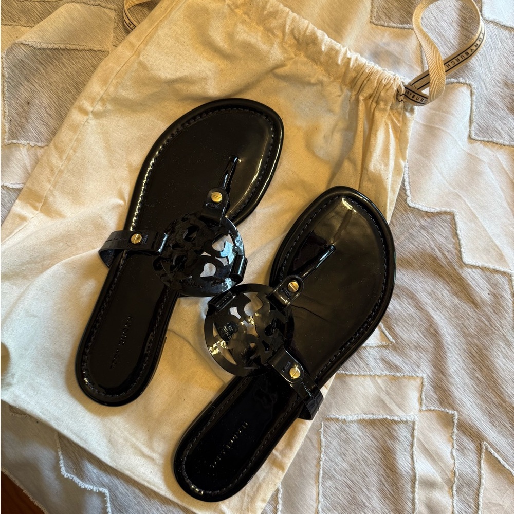 Tory Burch Black Sandals with Medallion Design